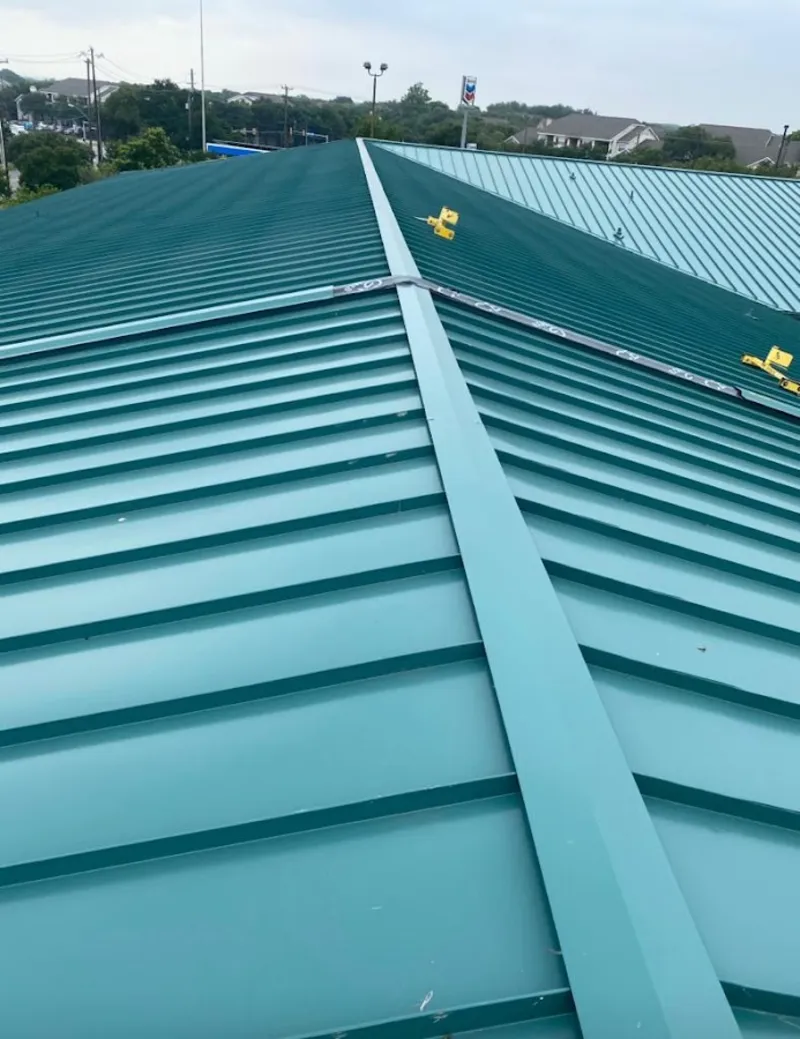 Green commercial metal roof ridge and valley for Metal Roof Repair in Wetumpka